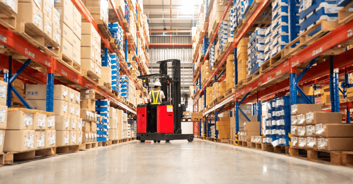 Logistics - fork lift in warehouse
