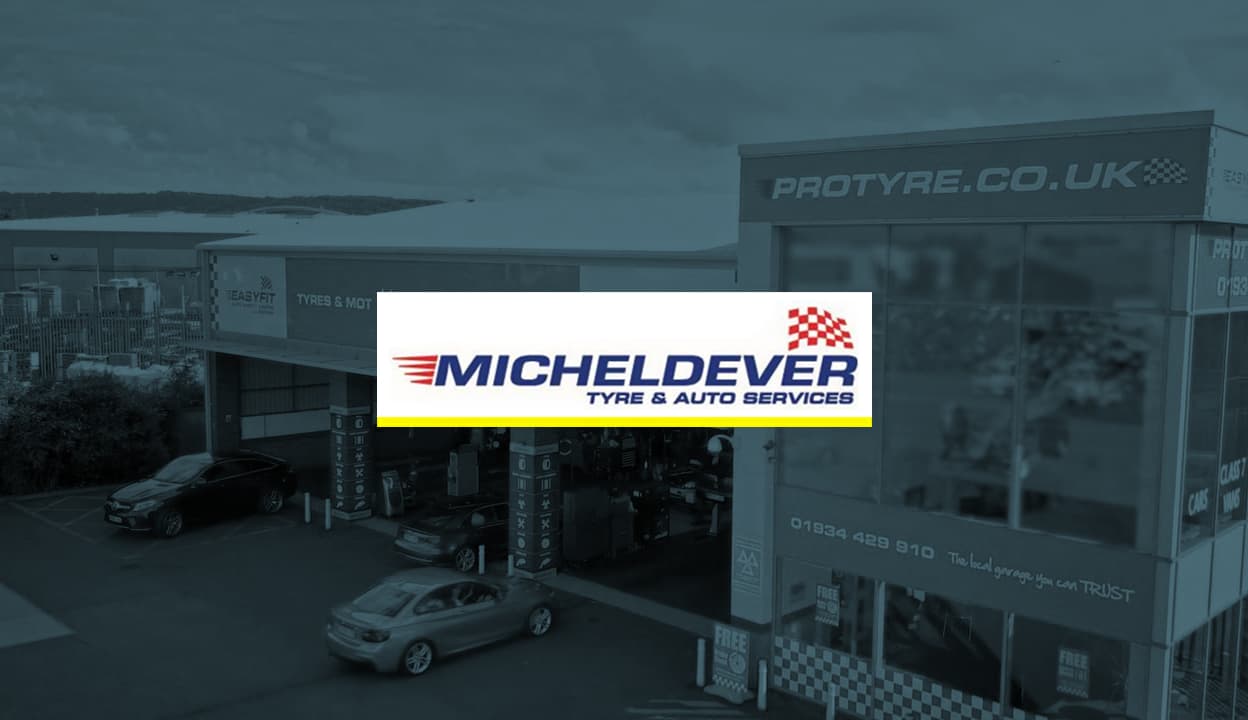 image of car showroom and garage with micheldelver logo over it - case study - desktop - blue overlay - 248x720.jpg